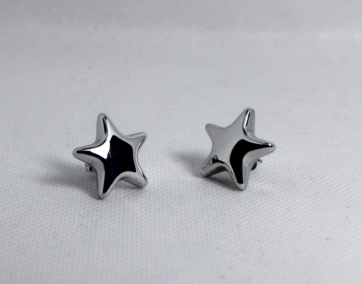 Aretes Estela plateados